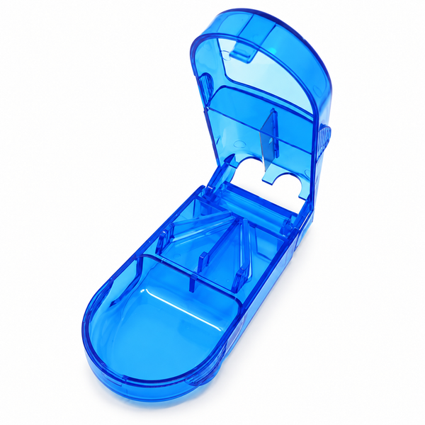 Blue pill cutter with hinged lid and tablet guide