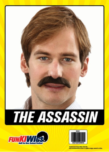 The Assassin Costume Moustache – Dark Brown, shown on the original Fun Kiwi packaging