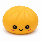 Yellow-orange smiling dumpling squishy
