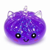 Purple translucent unicorn dumpling squishy with smiling face